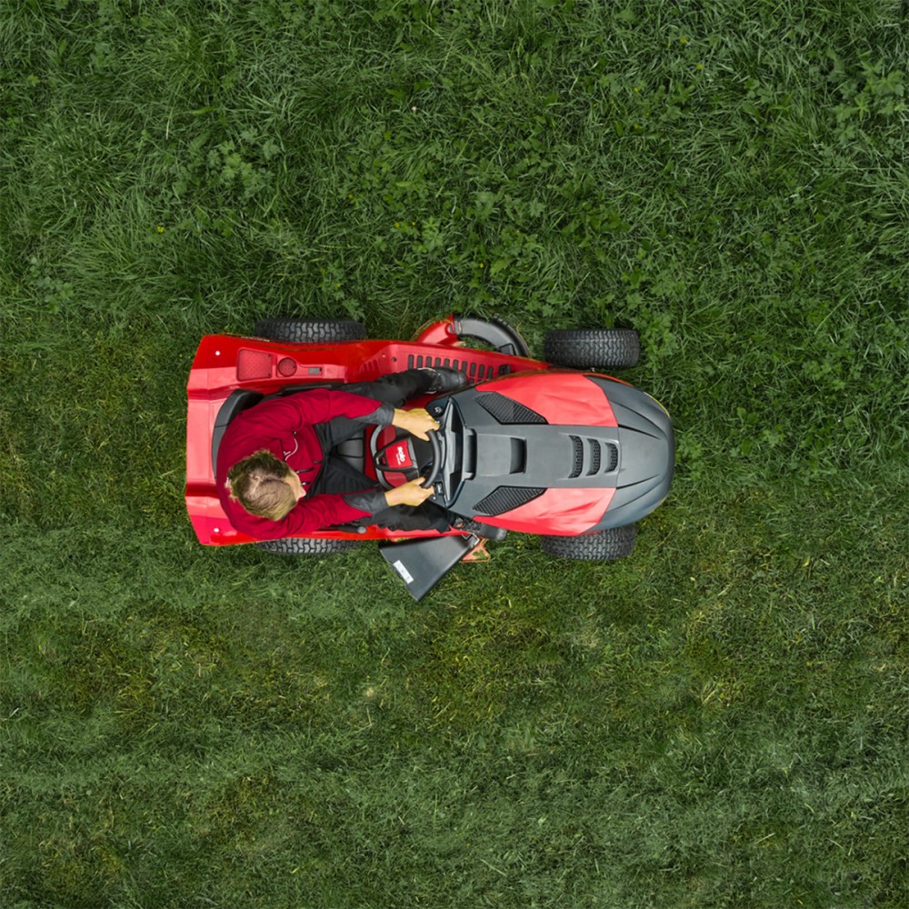 Red ride-on lawn mower, overhead view