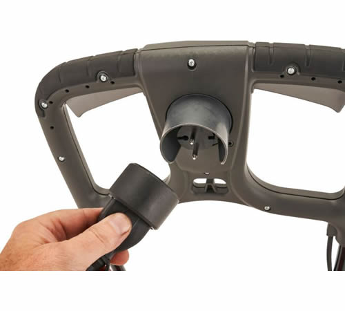 princess34el_detail06 - Mowers Online Hand inserting charging cable into lawn mower handle