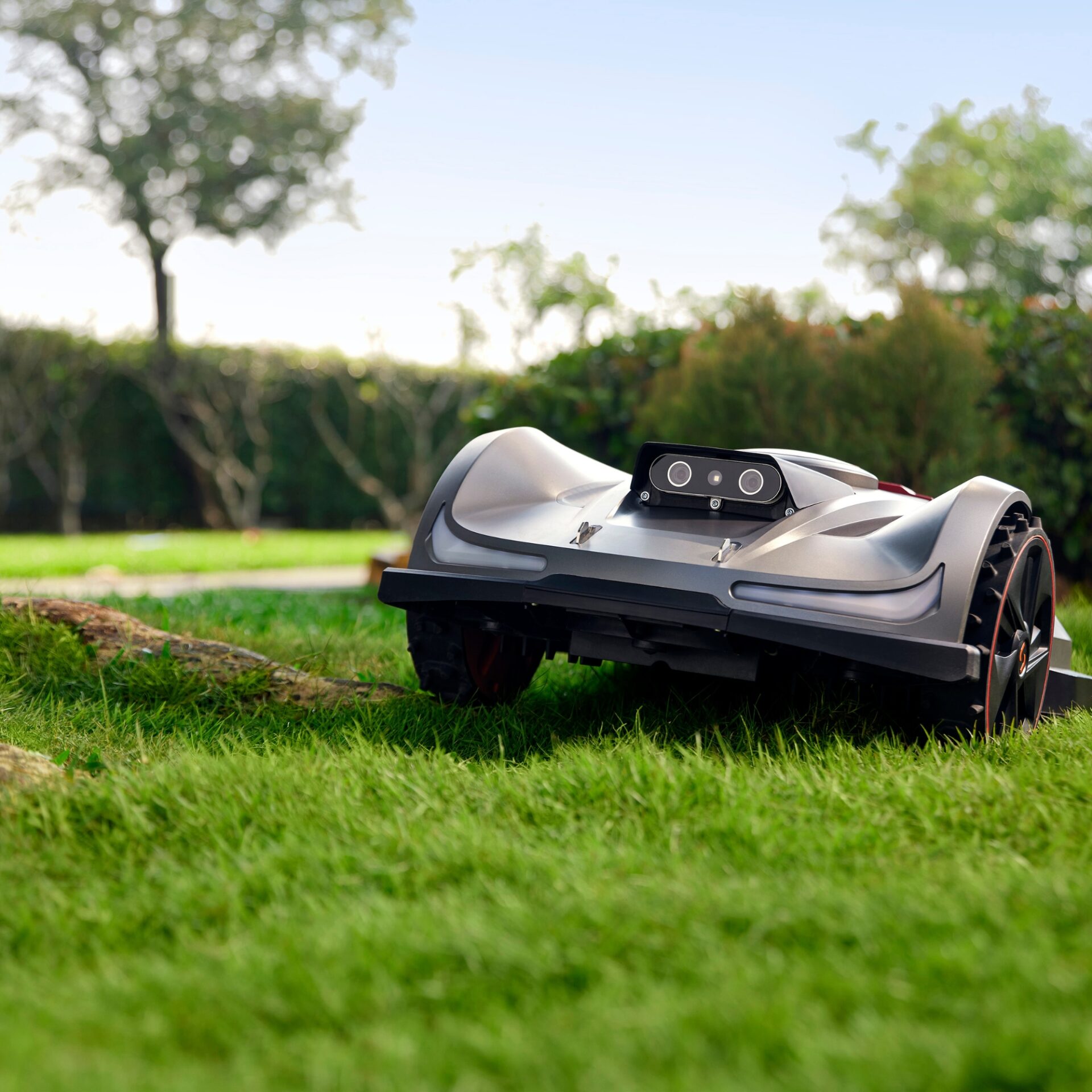 rgl0tw5jw0g.jpg - Mowers Online Robotic lawn mower on grass outdoors