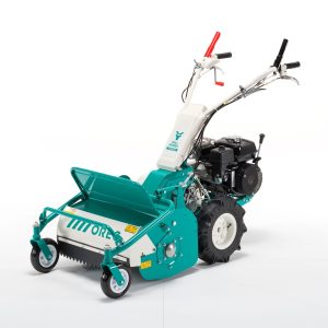 Turquoise walk-behind dethatcher with gas engine