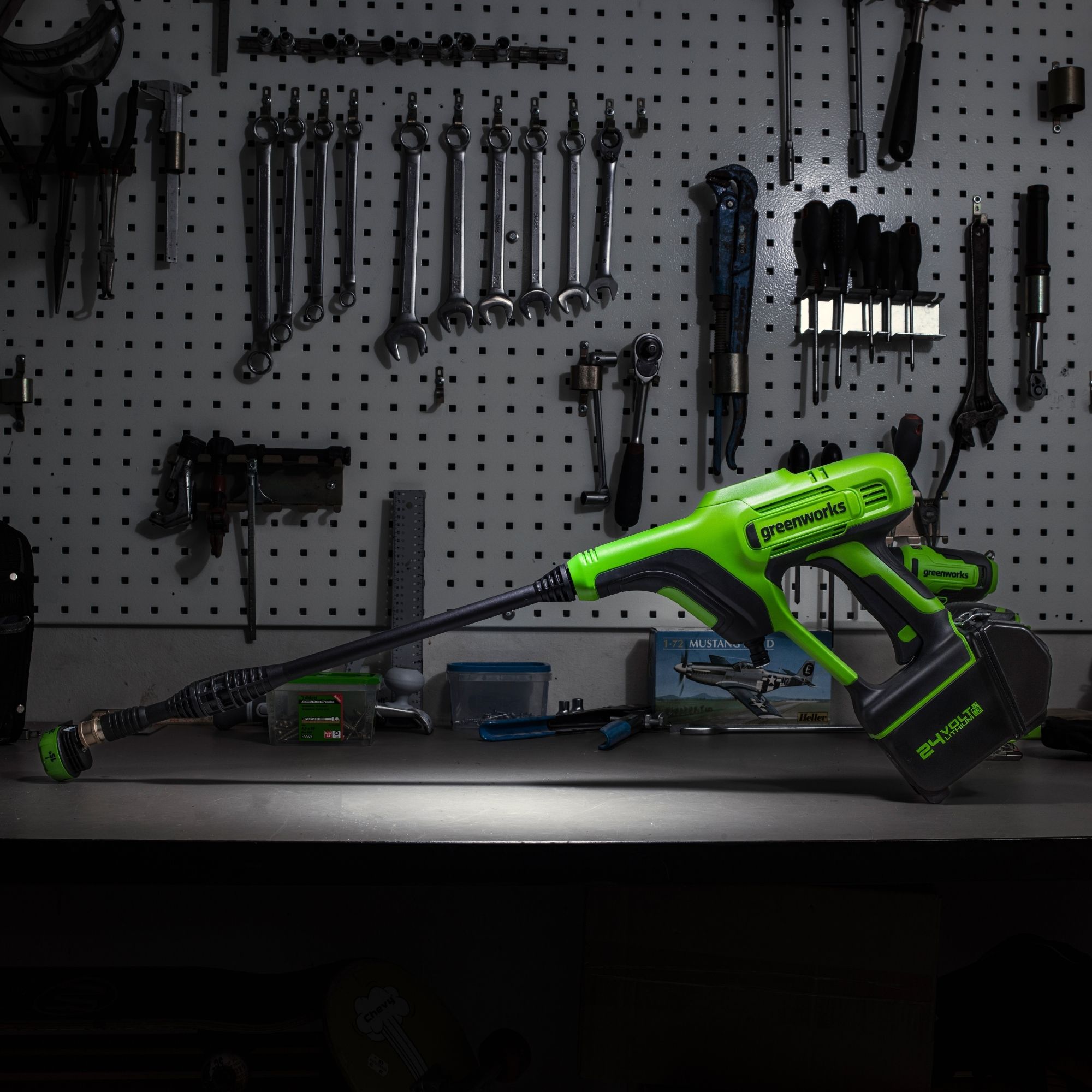 bycz1h0dqdq.jpg - Mowers Online Electric pressure washer with accessories on pegboard