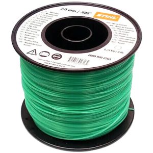 Spool of green trimmer line for lawn mower