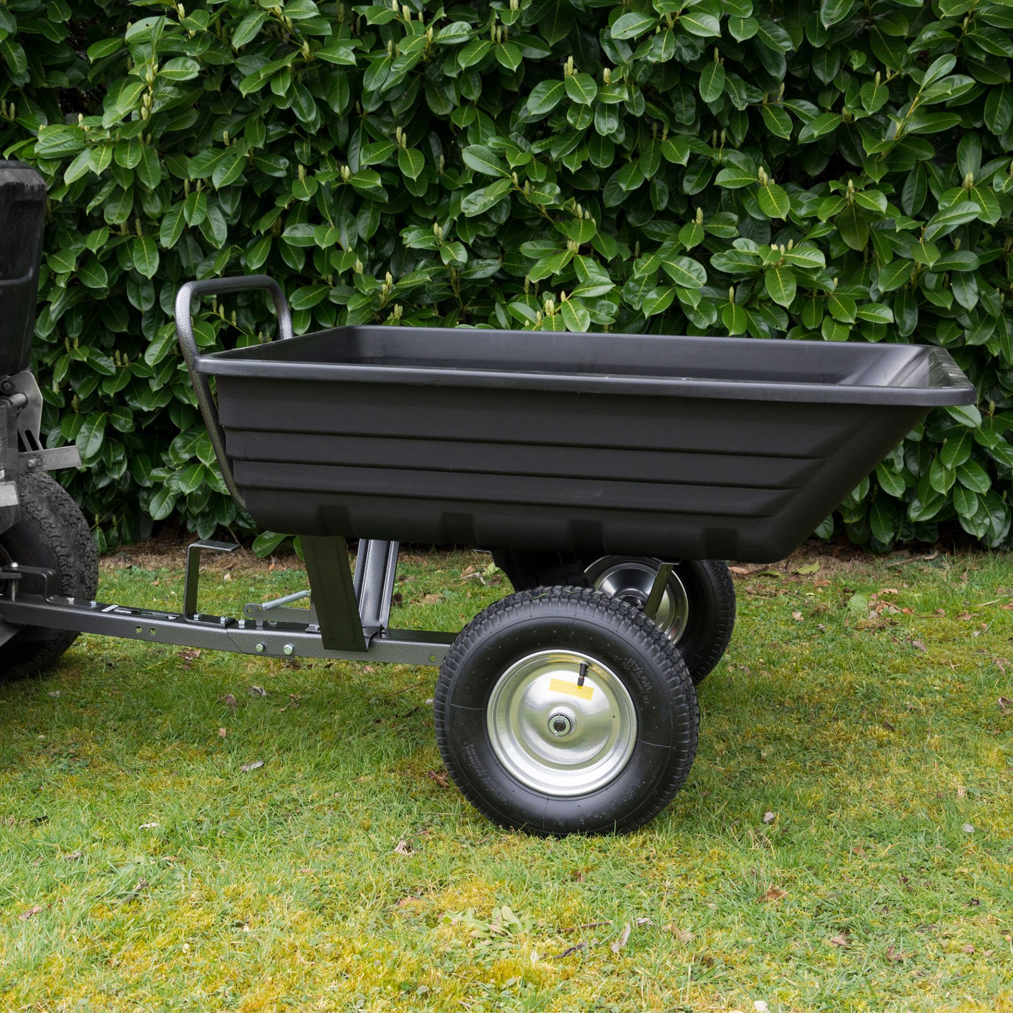 kpn3gc30wni.jpg - Mowers Online Black single-axle dump trailer with pneumatic tires