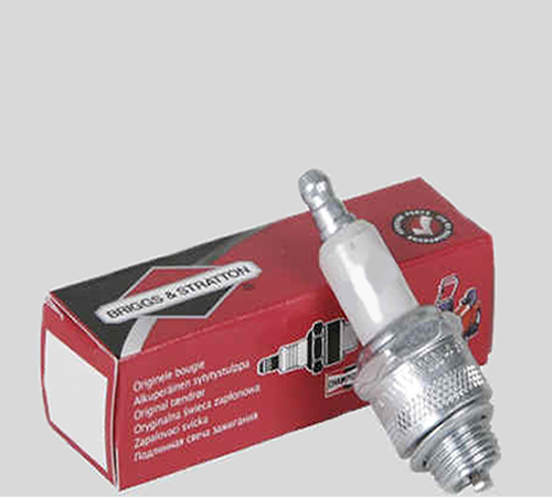 megy2khgjcy.png - Mowers Online Spark plug with red product packaging box