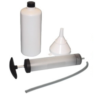 Fluid transfer kit with bottle, funnel, and syringe pump