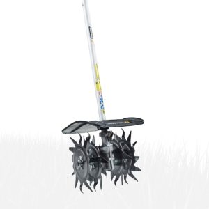 Rear tine tiller with cultivator tines attached