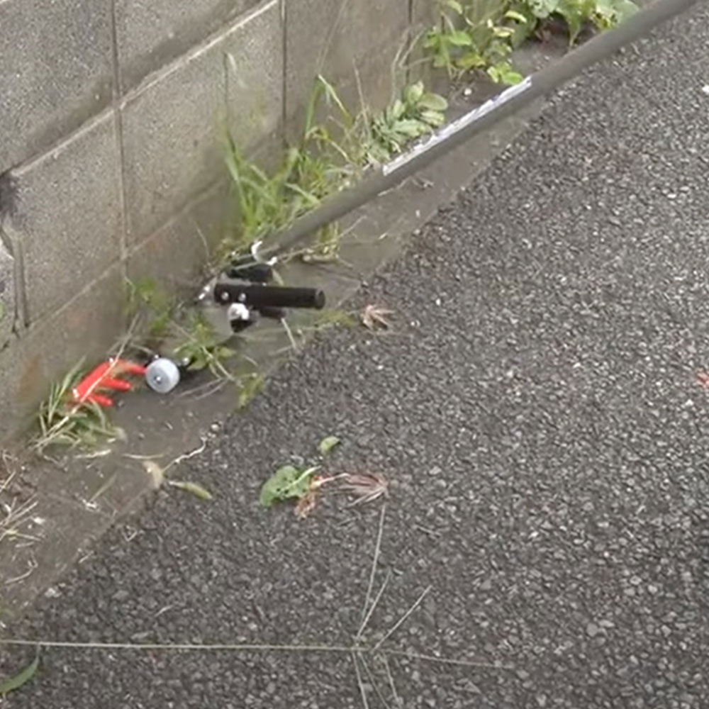 ud3xkysn4ki.jpg - Mowers Online Discarded litter on asphalt pavement
