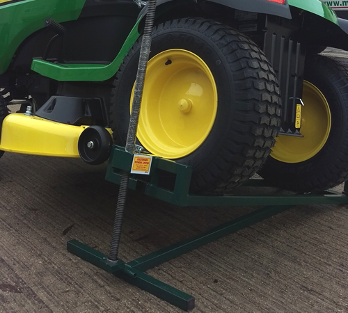 ulyu35zcmvd.png - Mowers Online Rear axle assembly with yellow wheels and hitch
